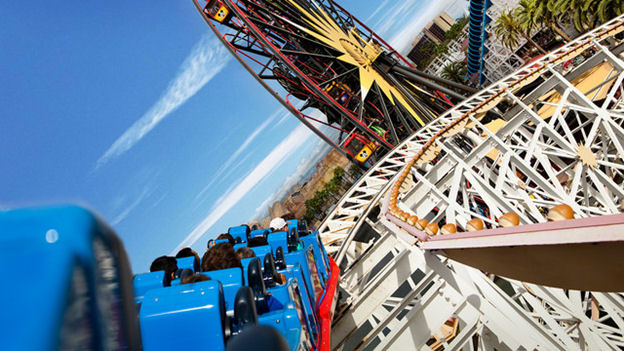 A rollercoaster car speeds around a steep bend at California Screamin' in Paradise Pier